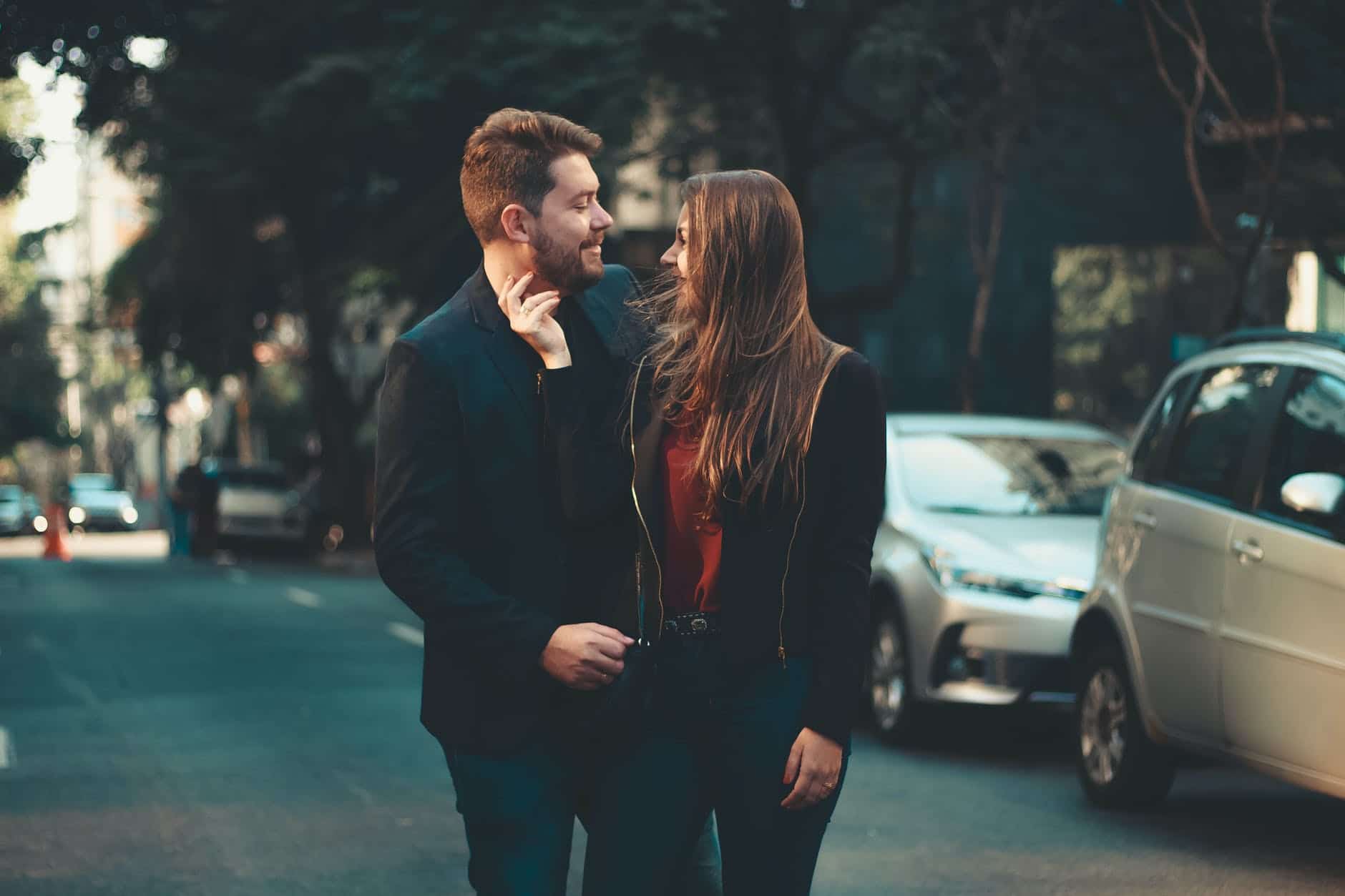 romantic young couple bonding on street