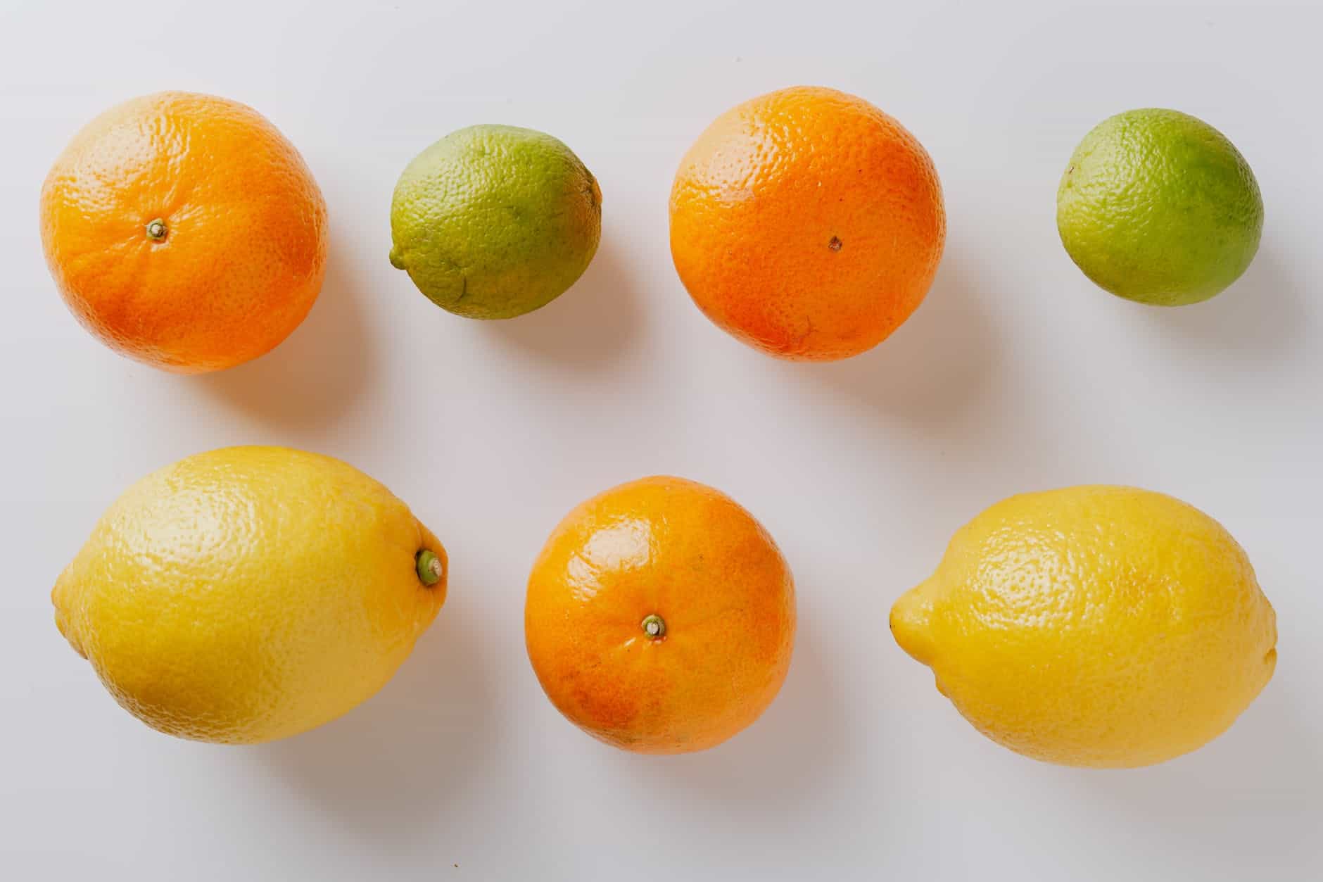 photo of orange near lemon
