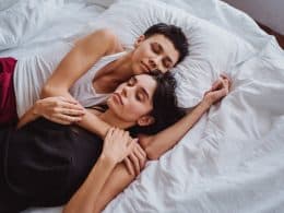 two women sleeping together